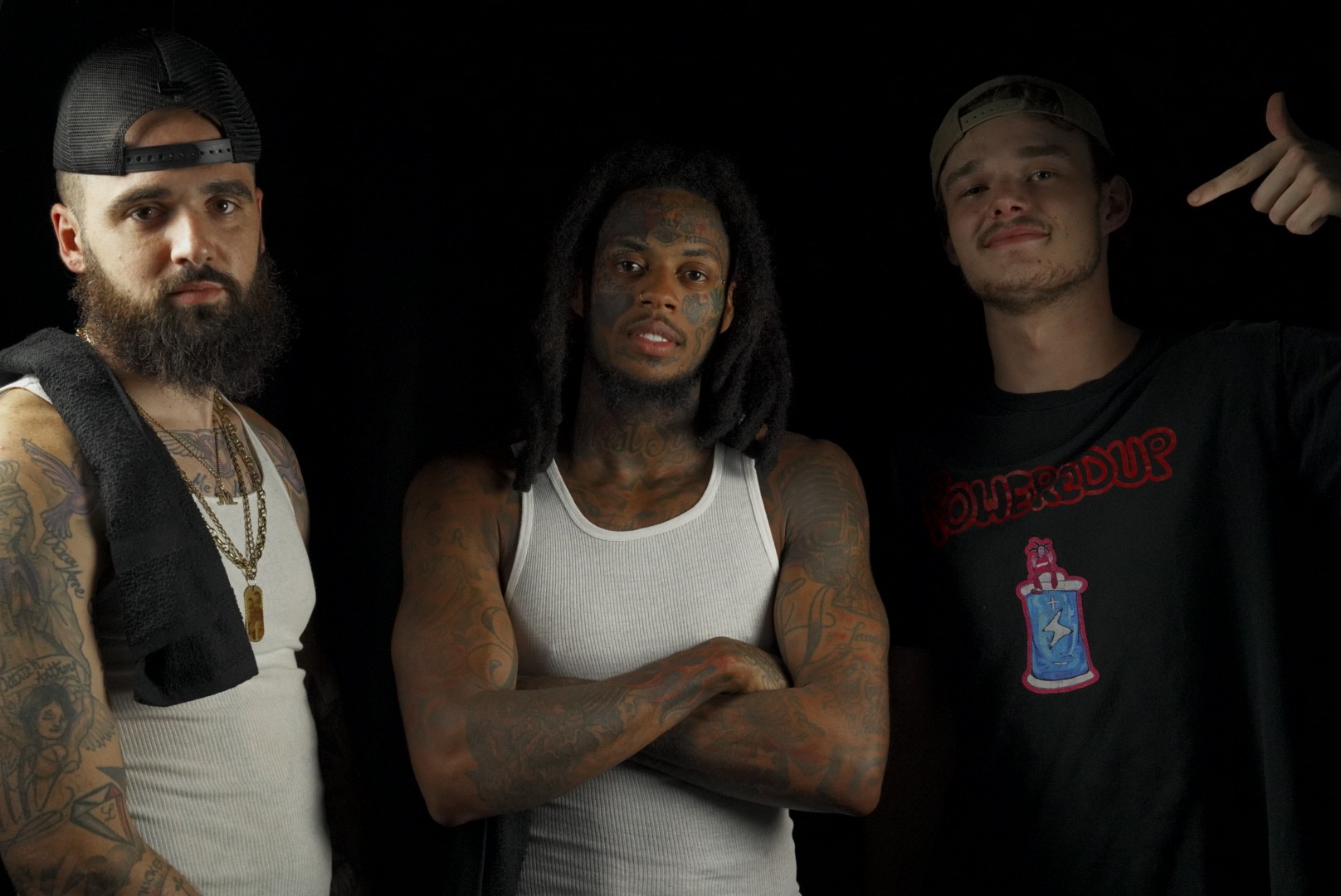Three artists together at a BLACKOUT BARS event